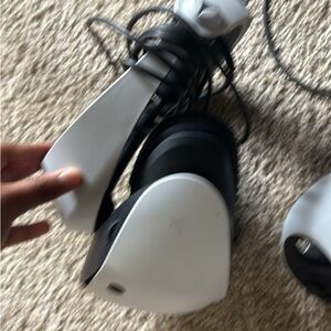 White and Black VR Headset and ps 5 with two controllers and headphones for ps 5